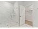 Beautiful bathroom featuring a glass shower, a shower head, and a connected closet at 1024 Sagegrass St, Summerville, SC 29485
