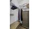 Well-organized closet with hanging clothes, storage boxes, and a wooden dresser for ample storage at 106 Pickering Ln, Charleston, SC 29414
