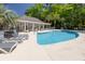Community pool with lounge chairs, perfect for relaxation and recreation at 106 Pickering Ln, Charleston, SC 29414