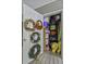Open storage area filled with shelves, bins, and cleaning supplies at 106 Pickering Ln, Charleston, SC 29414