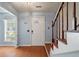 Entryway with wood floors, staircase, and an ornate front door design at 109 E Hartwick Ln, Goose Creek, SC 29445