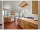 Kitchen with center island, hardwood floors, and eat in dining at 109 E Hartwick Ln, Goose Creek, SC 29445
