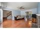 Spacious living room with hardwood floors, fireplace, and ample natural light at 109 E Hartwick Ln, Goose Creek, SC 29445