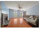 Cozy living room with fireplace, hardwood flooring, and natural light at 109 E Hartwick Ln, Goose Creek, SC 29445