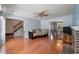 Spacious living room with hardwood floors, fireplace, and ample natural light at 109 E Hartwick Ln, Goose Creek, SC 29445