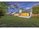 Spacious backyard with a patio and screened-in porch, perfect for outdoor entertaining at 109 Red Cypress Dr, Goose Creek, SC 29445