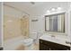 Cozy bathroom with a shower and tub combination and a dark vanity at 109 Red Cypress Dr, Goose Creek, SC 29445