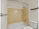 Traditional bathroom features a shower and tub combination with yellow tile at 109 Red Cypress Dr, Goose Creek, SC 29445