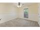 Carpeted bedroom with a ceiling fan and neutral paint at 109 Red Cypress Dr, Goose Creek, SC 29445