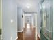 Bright foyer features sleek hardwood floors, neutral walls, and modern lighting at 109 Red Cypress Dr, Goose Creek, SC 29445