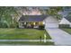 Charming single-story home with attached garage, manicured lawn, and inviting front porch at 109 Red Cypress Dr, Goose Creek, SC 29445