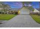 Charming single-story home with attached garage, manicured lawn, and inviting driveway at 109 Red Cypress Dr, Goose Creek, SC 29445