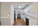 Well-lit kitchen featuring white cabinets and granite countertops at 109 Red Cypress Dr, Goose Creek, SC 29445
