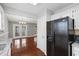 Open kitchen layout with modern appliances and views of the dining area at 109 Red Cypress Dr, Goose Creek, SC 29445