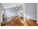 Open-concept living area with hardwood floors and plenty of natural light at 109 Red Cypress Dr, Goose Creek, SC 29445