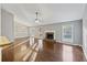 Spacious living room showcasing fireplace, natural light, and hardwood flooring at 109 Red Cypress Dr, Goose Creek, SC 29445