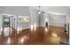 Open living room boasts vaulted ceilings, fireplace, and seamless flow into other spaces at 109 Red Cypress Dr, Goose Creek, SC 29445