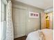 Comfortable bedroom with closet, gray walls, and cream-colored furnishings offers a relaxing retreat at 1106 Meadowcroft Ln, Mount Pleasant, SC 29464