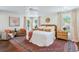Spacious bedroom featuring natural light, ceiling fan, and a decorative rug at 1106 Meadowcroft Ln, Mount Pleasant, SC 29464