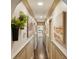 Hallway featuring beautiful decor, dark hardwood floors, and natural light at 1106 Meadowcroft Ln, Mount Pleasant, SC 29464