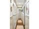 Hallway with decorative elements, lighting, and hardwood floors at 1106 Meadowcroft Ln, Mount Pleasant, SC 29464