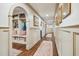 Hallway features a built-in bench, coat rack, and decorative mirrors at 1106 Meadowcroft Ln, Mount Pleasant, SC 29464
