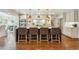 Spacious kitchen with a large island, modern lighting, and ample counter space at 1106 Meadowcroft Ln, Mount Pleasant, SC 29464