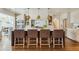 Gourmet kitchen boasts stainless steel appliances, custom cabinets, and a center island at 1106 Meadowcroft Ln, Mount Pleasant, SC 29464