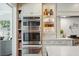 Modern kitchen featuring stainless steel appliances, custom cabinetry, and ample storage space at 1106 Meadowcroft Ln, Mount Pleasant, SC 29464