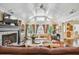 Spacious living room with vaulted ceilings, fireplace, ample seating, and abundant natural light at 1106 Meadowcroft Ln, Mount Pleasant, SC 29464