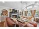 Spacious living room with vaulted ceilings, fireplace, and plenty of seating at 1106 Meadowcroft Ln, Mount Pleasant, SC 29464