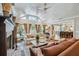 Bright and spacious living room with vaulted ceilings, fireplace, and open layout to the kitchen at 1106 Meadowcroft Ln, Mount Pleasant, SC 29464