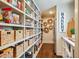Walk-in pantry with ample shelving, providing organized storage at 1106 Meadowcroft Ln, Mount Pleasant, SC 29464