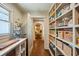 Well-organized pantry with shelving and storage baskets near the kitchen area at 1106 Meadowcroft Ln, Mount Pleasant, SC 29464
