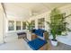 Covered patio with comfortable seating area, ceiling fan, and inviting outdoor space at 1106 Meadowcroft Ln, Mount Pleasant, SC 29464