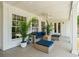 Covered patio with comfortable seating area, ceiling fan, and inviting outdoor space at 1106 Meadowcroft Ln, Mount Pleasant, SC 29464