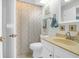 Bright bathroom featuring a shower with patterned curtain and a sink with an ample counter at 1136 Shadow Lake Cir # 54, Mount Pleasant, SC 29464