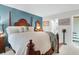 Comfortable bedroom with a king size bed, ensuite bathroom and natural light at 1136 Shadow Lake Cir # 54, Mount Pleasant, SC 29464