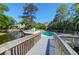 Inviting community pool area with lush landscaping, providing a refreshing escape for residents at 1136 Shadow Lake Cir # 54, Mount Pleasant, SC 29464