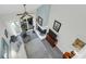Sunlit living room with a fireplace, comfortable seating, ceiling fan and glass doors to the outside at 1136 Shadow Lake Cir # 54, Mount Pleasant, SC 29464