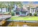 Charming townhouse with rear patio overlooking the serene waters and wooden bridge at 1136 Shadow Lake Cir, Mount Pleasant, SC 29464