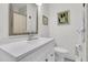 Bright bathroom features a white vanity and tiled shower at 1142 Camden St, North Charleston, SC 29405