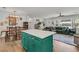 Bright living space with modern kitchen island, dining table, and comfortable sitting area at 1142 Camden St, North Charleston, SC 29405