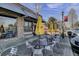 Outdoor patio with tables and chairs, perfect for enjoying a meal at 1142 Camden St, North Charleston, SC 29405