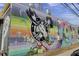 Exterior mural of a moose with vibrant colors and artistic design at 1142 Camden St, North Charleston, SC 29405