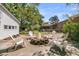 Inviting backyard fire pit area surrounded by chairs, perfect for outdoor entertaining at 1142 Camden St, North Charleston, SC 29405