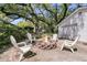 Cozy backyard with a fire pit and ample seating, ideal for gatherings at 1142 Camden St, North Charleston, SC 29405