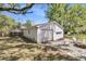 Detached garage with ample space, complemented by a cozy fire pit area at 1142 Camden St, North Charleston, SC 29405