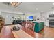 Open concept living area with kitchen island and dining space at 1142 Camden St, North Charleston, SC 29405