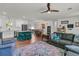 Open concept living area, showcasing a kitchen island, dining area, and comfortable seating at 1142 Camden St, North Charleston, SC 29405